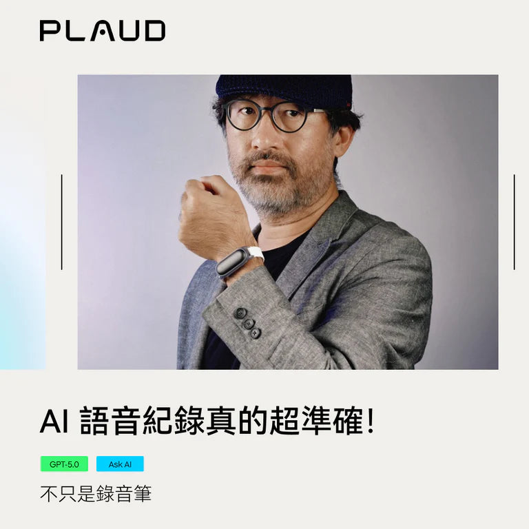 戴眼鏡、帽子和鬍子的男士，穿西裝外套，直視鏡頭。
